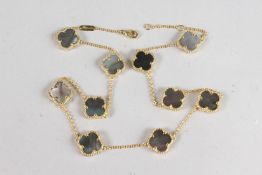 A SILVER GILT AND MOTHER-OF-PEARL CLOVER NECKLACE.