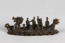A JAPANESE BRONZE DRAGON BOAT. 6.5ins long.