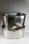 A LARGE PAIR OF LILY BOLLINGER WINE COOLERS. 24ins long x 12ins high.