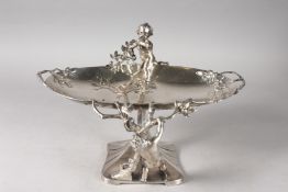 A GOOD W.M.F. ART DECO SILVERED METAL OVAL DISH with cupid supports. 13ins wide x 8ins high.