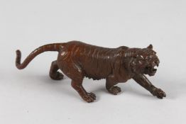 A JAPANESE BRONZE TIGER. 6ins long.