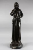 A TALL BRONZE DECO STANDING GIRL 