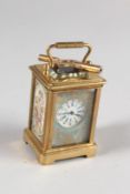 A GOOD MINIATURE SEVRES PORCELAIN TYPE CARRIAGE CLOCK. 2.25ins high.