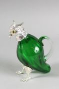 A GLASS AND PLATE NOVELTY COCKATOO CLARET JUG. 6ins high.