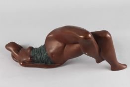 AN ABSTRACT - LYING NUDE. 19ins long.