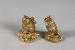 TWO PLATED CAT AND OWL SEALS.