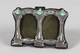 A SMALL SILVER DOUBLE PHOTOGRAPH FRAME. 3ins x 4.25ins.