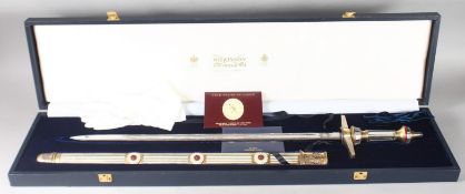 A WILKINSON E.R. PRESENTATION SWORD No. 0084, with metal and crystal handle. Engraved blade: Her