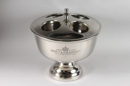 A MOET & CHANDON FOUR-BOTTLE WINE COOLER. 14ins long x 13ins high.