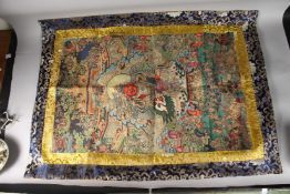 A TIBETAN THANGKA ON SILK.