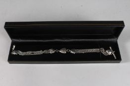 A SILVER ALBERTINA CHAIN.