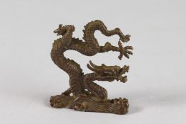 A JAPANESE BRONZE DRAGON. 3ins high.