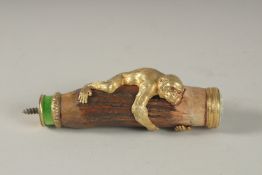A VERY GOOD RUSSIAN SILVER AND ENAMEL HARDSTONE MONKEY CANE TOP. 4.5ins high, in a fitted box.