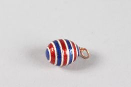 A RUSSIAN 14CT GOLD STRIPED ENAMEL EGG.