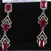 A PAIR OF SILVER, GOLD POST RUBY AND DIAMOND EARRINGS.