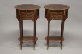 A PAIR OF LOUIS XVITH STYLE OVAL SIDE TABLES with cross-banded tops, three small drawers on