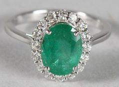 AN 18CT YELLOW GOLD, EMERALD AND DIAMOND RING, Emerald 2.20ct, diamond 0.42ct.