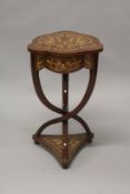 A GOOD SHAPED TOP INLAID BEDSIDE TABLE, with single drawer and cross curving legs. 2ft 6ins high.