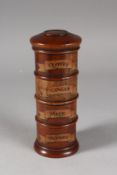 A FOUR-DIVISION SPICE TOWER, CLOVES, GINGER, MACE AND NUTMEG. 8ins high.