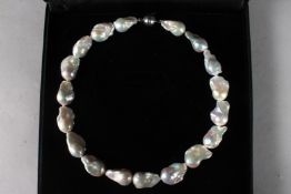 A BAROQUE PEARL NECKLACE, with magnetic clasp.