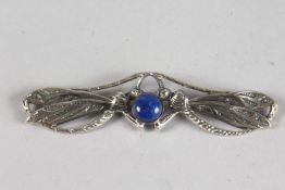 A SILVER AND LAPIS DRAGONFLY BROOCH.