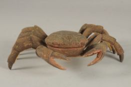 AN UNUSUAL JEWELLERY BOX, in the form of a carved wood and painted crab. 27cms wide.