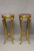 A GOOD PAIR OF CIRCULAR MARBLE TOP STANDS. 3ft 7ins high x 1ft 6ins wide.