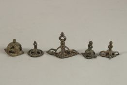 A GROUP OF FIVE 17TH CENTURY TIBETAN OR SOUTH INDIAN BUDDHIST BRONZE STAMPS, (5).