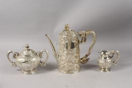 A VERY FINE CHINESE WANG HING SILVER COFFEE SET, comprising a coffee pot, sucrier, and cream jug,