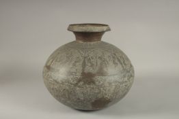 A LARGE AND RARE 18TH CENTURY NORTH INDIAN RAJASTAN BRASS LOTA, engraved with dancers and mythical