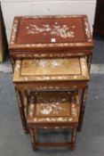 A CHINESE MOTHER OF PEARL INLAID NEST OF THREE TABLES, (one missing), 66cm high, 51cm wide, 36cm