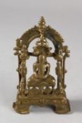 A RARE AND FINE 14TH CENTURY OR EARLIER SOUTH INDIAN BRONZE JAIN SHRINE, 14cm high.
