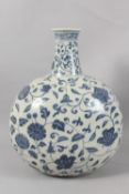 A VERY LARGE CHINESE BLUE AND WHITE PORCELAIN FLORAL MOON FLASK VASE, 43cm high.
