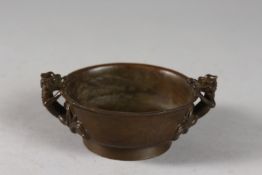 A SMALL CHINESE BRONZE TWIN HANDLE CENSER, the handles formed as chilong, base with character