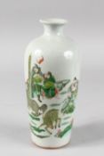 A CHINESE FAMILLE VERTE PORCELAIN VASE, painted with immortals, deer, and dog of fo, 25cm high.