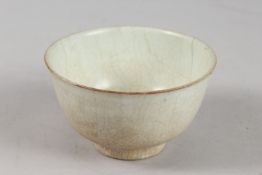 A CHINESE MING DYNASTY POTTERY BOWL, 14cm diameter.