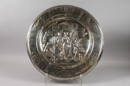 A FINE ELKINGTON EGYPTIAN REVIVAL SILVER PLATED CHARGER, signed Thomas Spall and A. Williams,