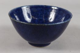 A CHINESE MOTTLED BLUE GLAZE PORCELAIN BOWL, with faint dragon design to exterior, base with six-