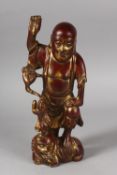 A CHINESE GILDED AND PAINTED BRONZE FIGURE, 31cm high.