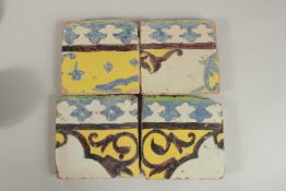 A COLLECTION OF FOUR 18TH CENTURY PERSIAN CUERA SECA POTTERY TILES, (4).