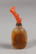 A CHINESE AGATE SNUFF BOTTLE AND STOPPER, 11.5cm high.