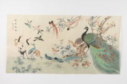 A LARGE CHINESE PAINTING ON SILK, depicting peacocks and other birds, inscribed and bearing red seal