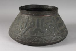 AN ISLAMIC METAL BOWL WITH LARGE CALLIGRAPHY, 35cm diameter.