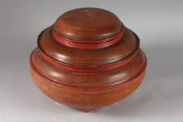 A LARGE 19TH-20TH CENTURY BURMESE RED LACQUER CIRCULAR BOX, comprising of four pieces, 36cm