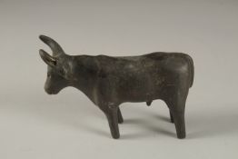 A POSSIBLY ANCIENT LURISTAN OR INDUS VALLEY BRONZE BULL, 13.5cm long.
