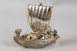 A JAPANESE SILVER MODEL OF A BOAT, 15.5cm high.