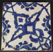 AN 18TH CENTURY OTTOMAN GLAZED POTTERY TILE, 20cm square.