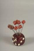 A RARE EARLY 20TH CENTURY ART DECO BAKELITE CHERRY AMBER TYPE DICE SHAPED COCKTAIL FOLKS.