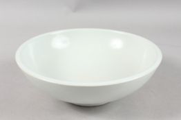 A LARGE CHINESE WHITE GLAZE PORCELAIN BOWL, with character mark to base, 28cm diameter.