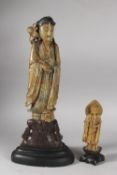 TWO CHINESE CARVED SOAPSTONE FIGURES, largest 31cm high (excl.stand).